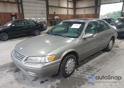 1999 Toyota Camry Le from USA, damaged, VIN 4T1BG22K3XU556347